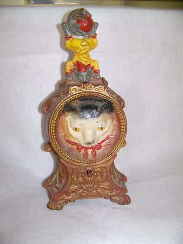 VINTAGE CAST IRON MECHANICAL BANK
